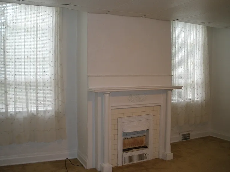 Bedroom 2 partial view with closet leads into sunroom/bonus room