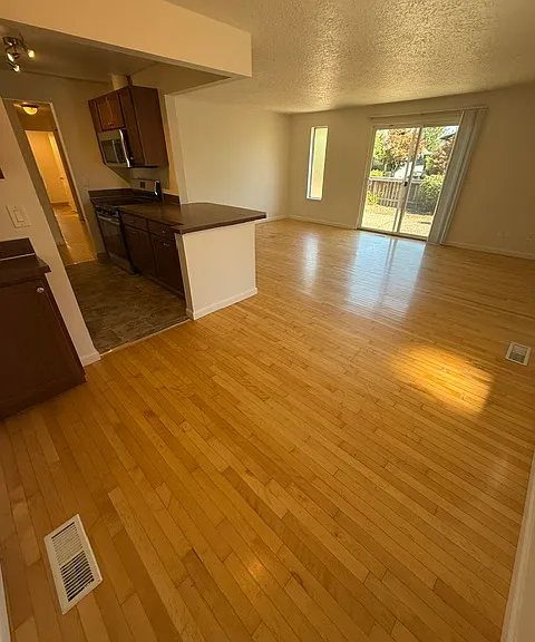 6115 S Kelly Ave — Photo 6