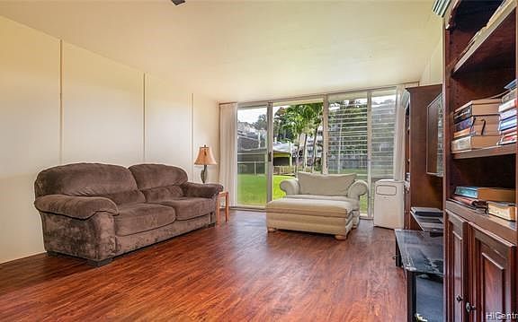 Living room extended approx. 2 feet with AOAO approved protocol during remodel . Minimally furnished with a short term left on tenant lease.