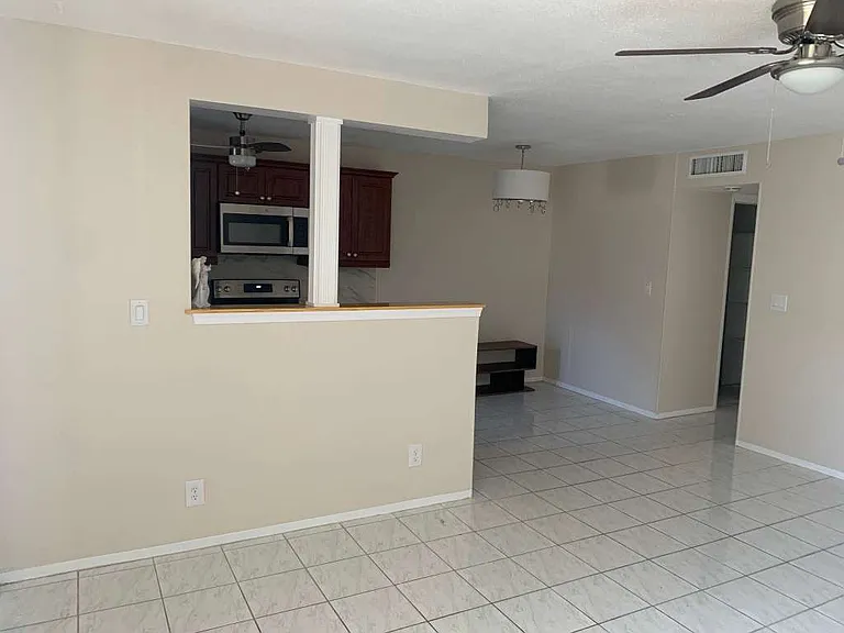 open concept living dining kitchen