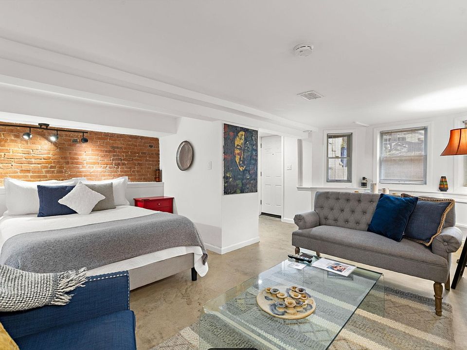 Bed opens up to seating/coffee table and a TV