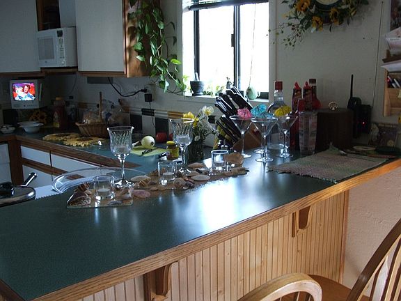 side bar viewing the kitchen to the left