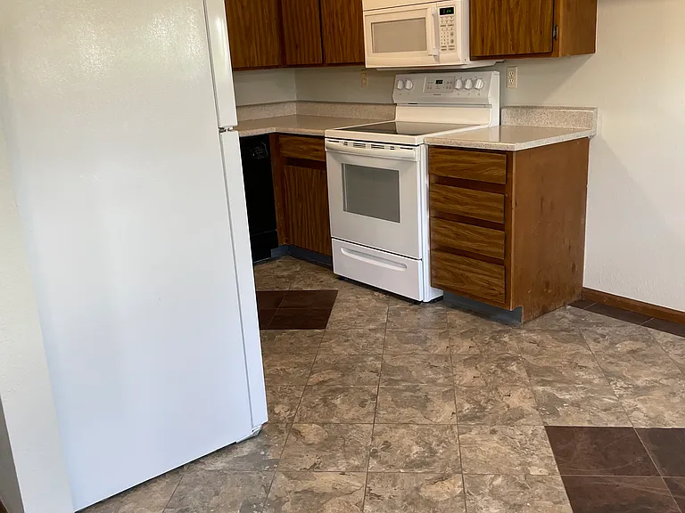 Unit 3 looking into kitchen and dining area