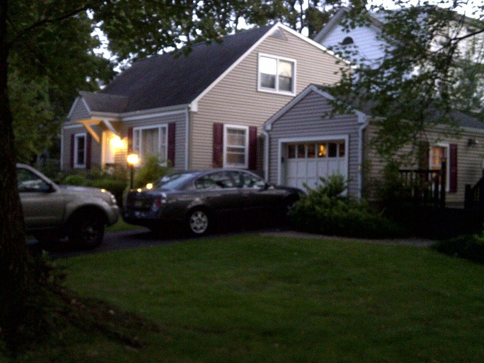 With new siding and dormer