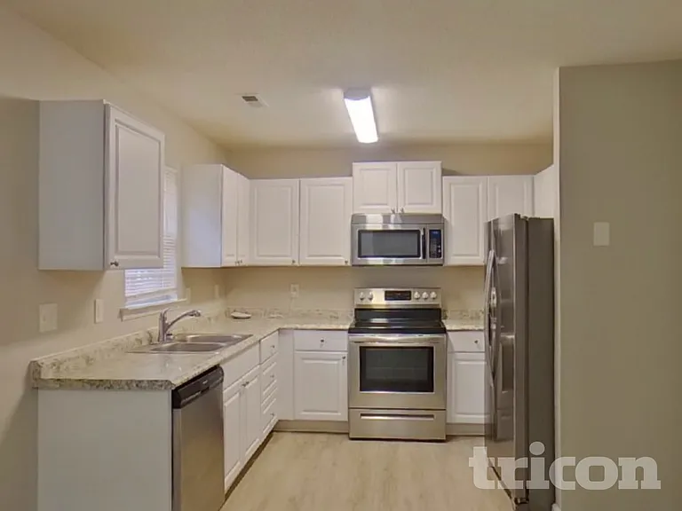 7112 Windsong Way — Photo 7