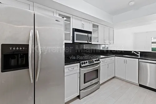2977 McFarlane Rd #Penthouse 10 Photo 1