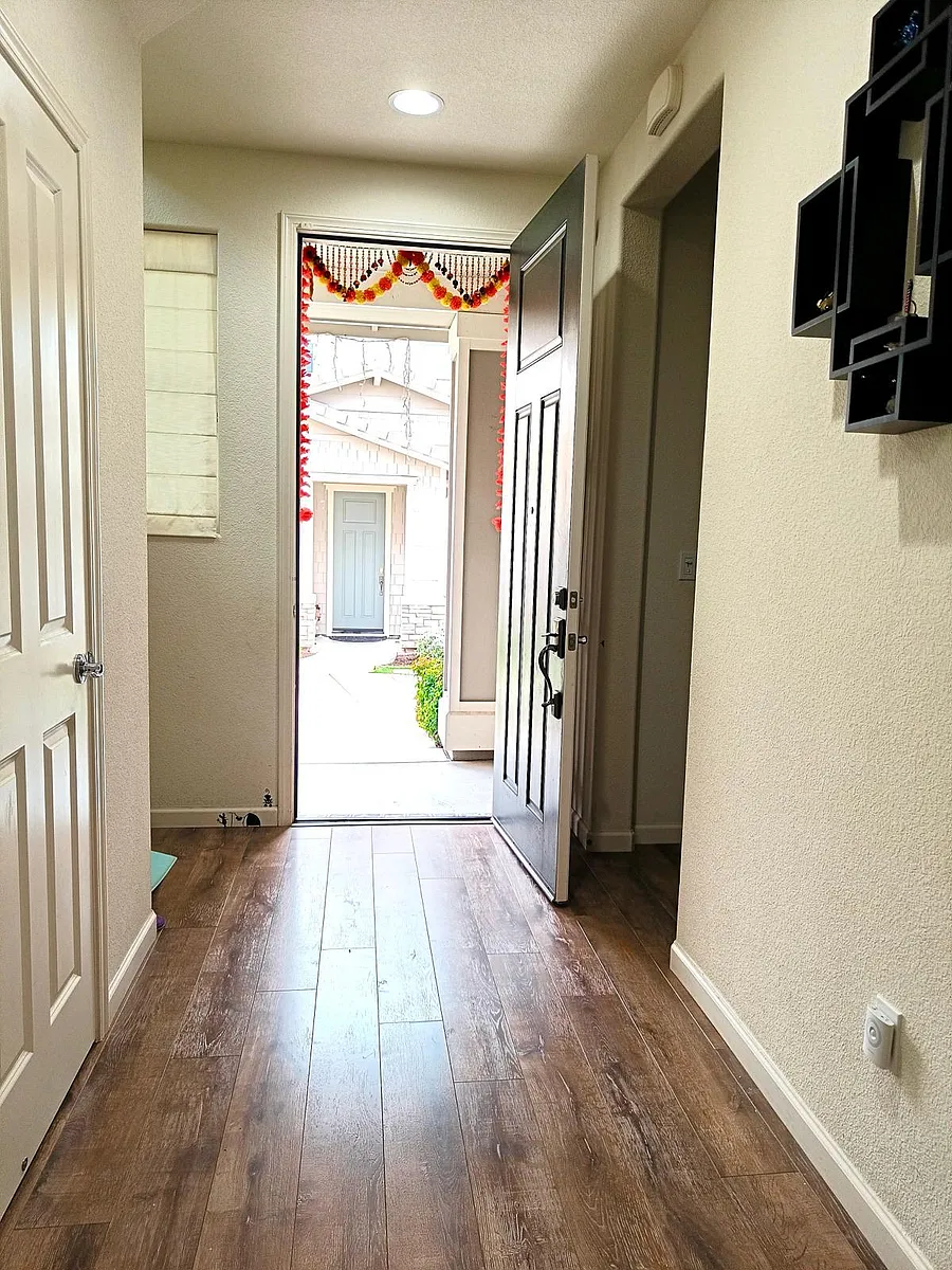 Photo 2 of 37 - S Fowler Ln - Mountain House, CA Welcome home! Experience seamless entry from the alley into your private sanctuary. A charming pathway awaits, leading to the heart of your abode. Private entrance, making every arrival a joyous moment. ____ - S Fowler Ln