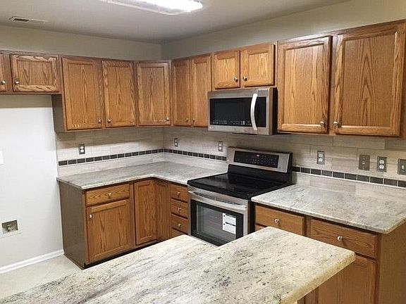 Newer appliances and lighting too. Refrigerator included or can be moved to garage for your convenience.