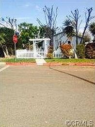 Entrance off of Emden. Note charming "white picket fence and