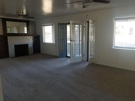 Wonderful breezes flow through front entry. Living room