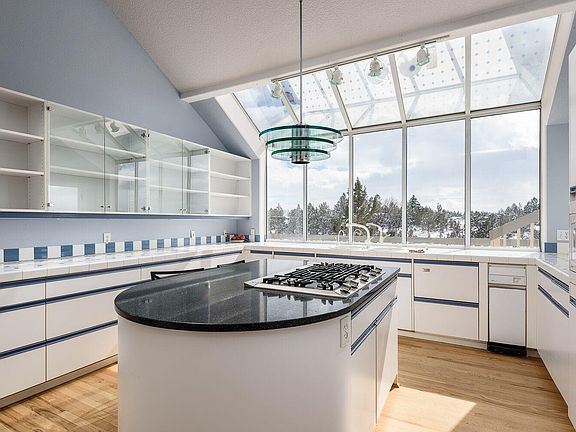 Spacious kitchen w/ abundant windows
