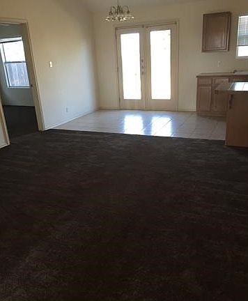 Open living/dining/kitchen areas. New carpet and paint thro