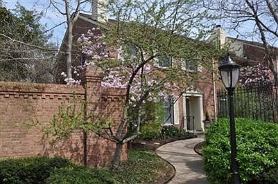 This outstanding downtown townhouse has been renovated over the past 4-6 years and is in beautiful move-in ready condition. It is located in the gated community of Opera House Square and is within walking distance of all the wonderful downtown restaurants