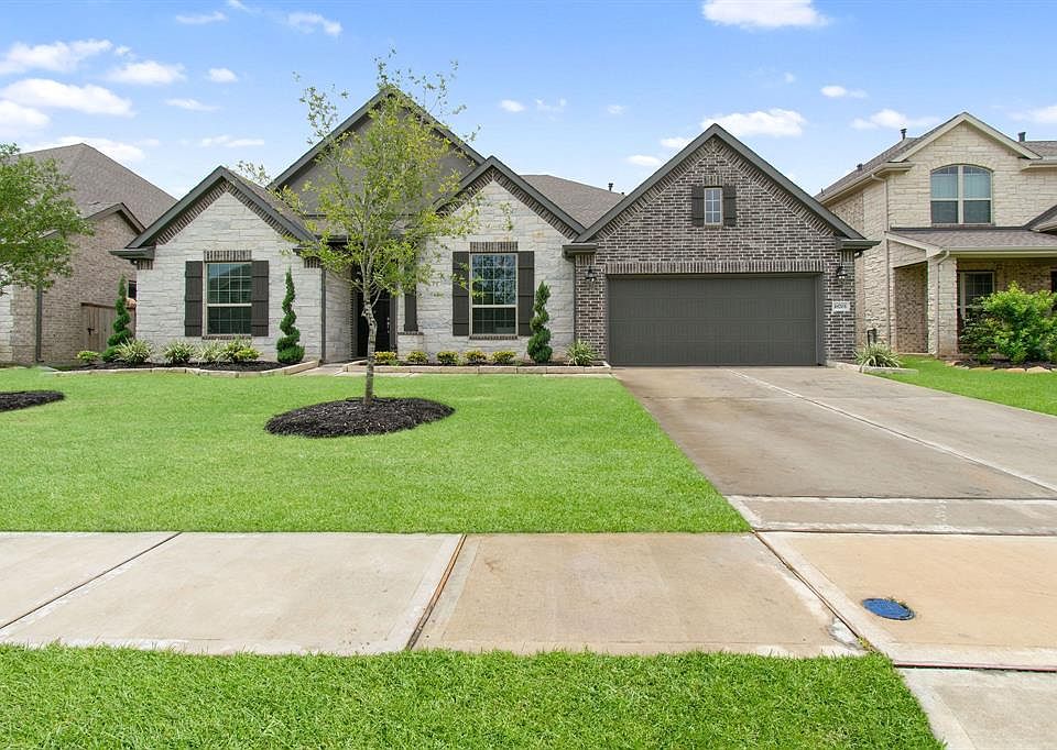 Beautiful home featuring 3 bedrooms downstairs and 2 bedrooms upstairs.