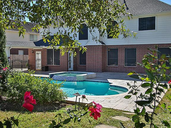 Oasis backyard w/ pool & spa added 2012.  Waterfall features & top of the line pool equipment w/ remote.  Removable pool security fencing.