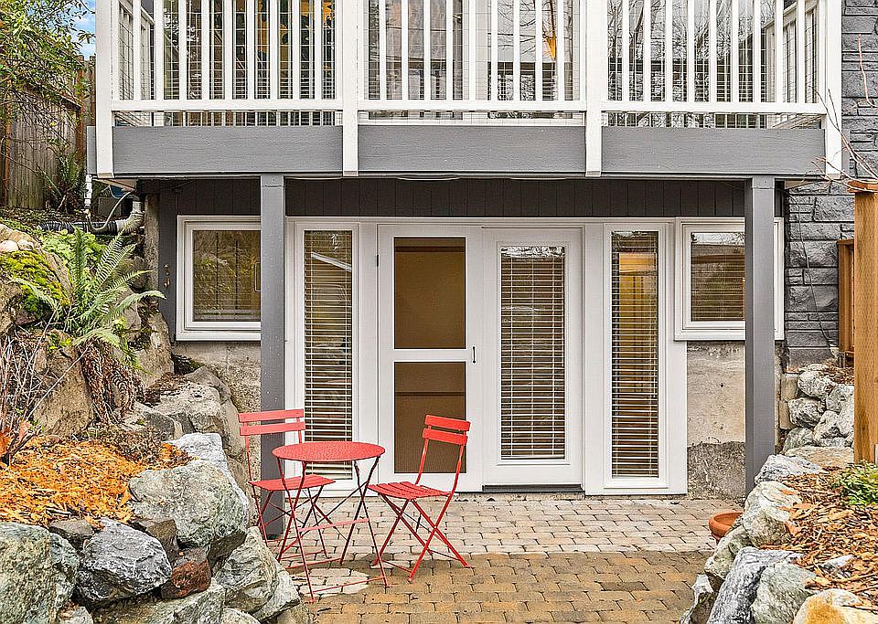 Entry to the apartment. Brand new French Doors (with a screen door) and west facing patio.
