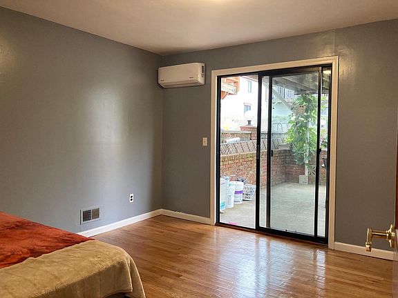Master Bedroom with sliding glass door to backyard