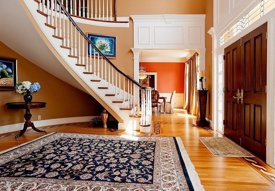 Gorgeous staircase & double height ceiling