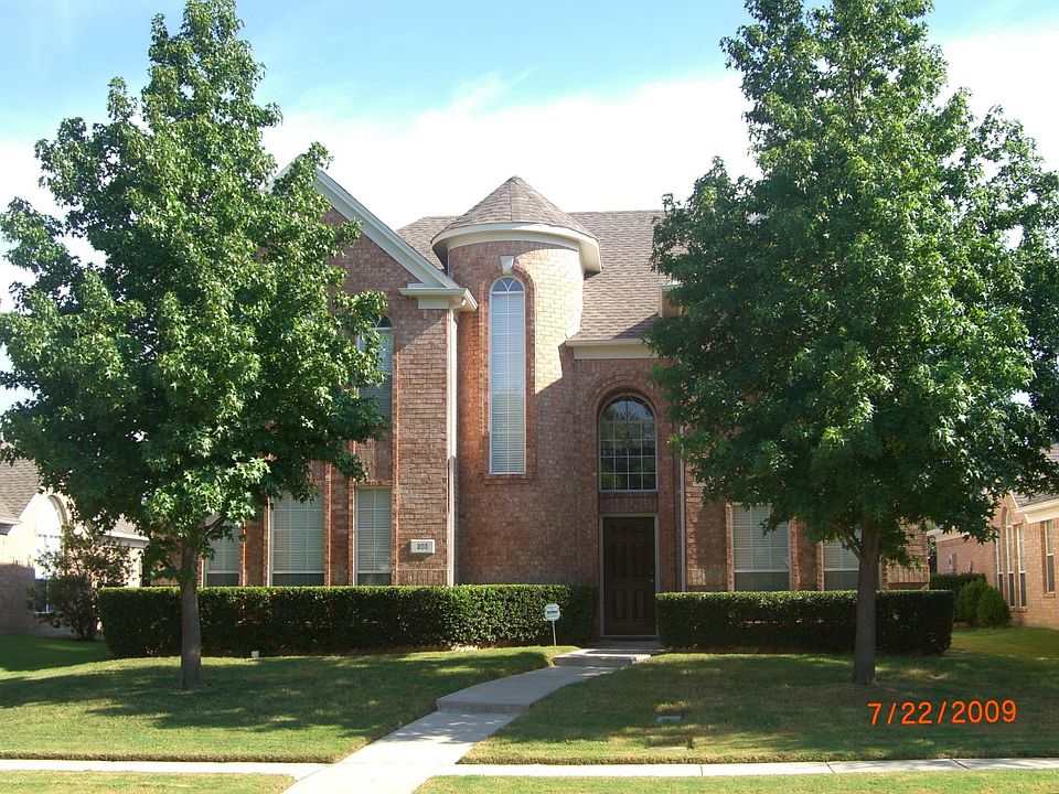 Front w/ 2 Large Maples