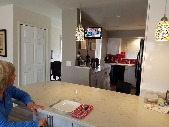 Watching tv in the kitchen