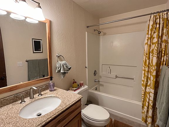Master bathroom with shower tub.
