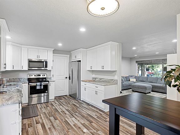 Beautifully updated kitchen is the perfect place to whip up your culinary creations.