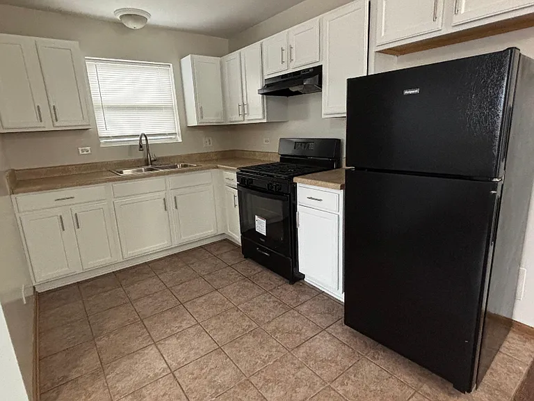 7456 S Stewart Ave — Photo 1