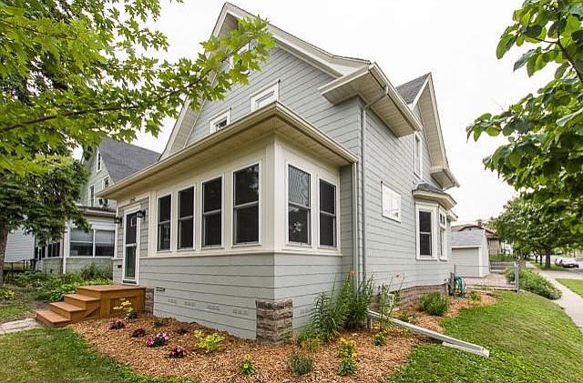 Gorgeous Victorian with beautiful heavy oak woodwork and hardwood floors through out this lovely upd