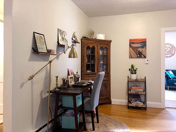 living room/entry as furnished by current tenants