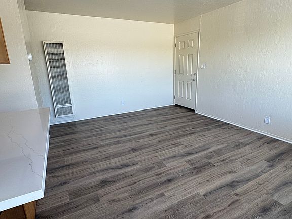 Living room also has wall heater to warm the unit on chilly winter nights.