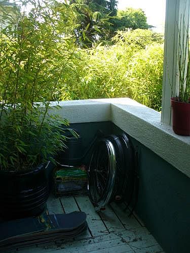 Cozy outdoor space can accomodate a "bar" or cafe table.