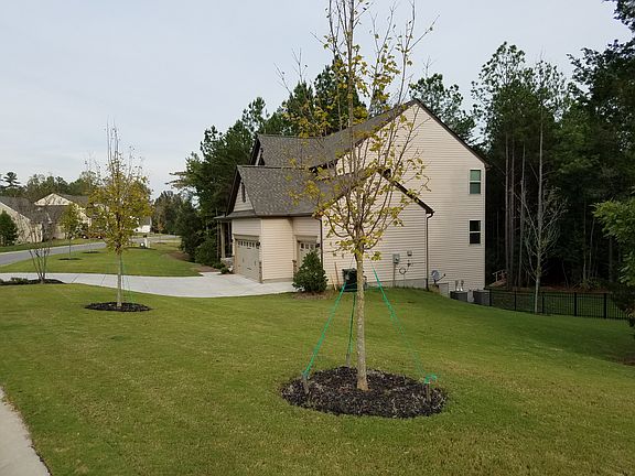 Fully sodded yard with fence