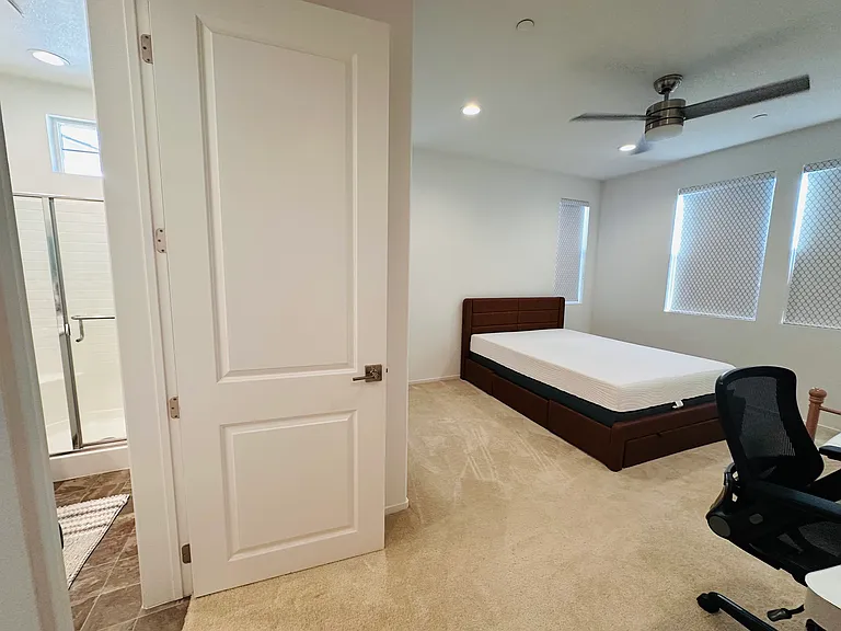 Bedroom 2 - Long view with bathroom door
