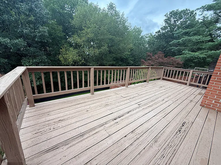 Overlooking scenic wooden area and private walking trail