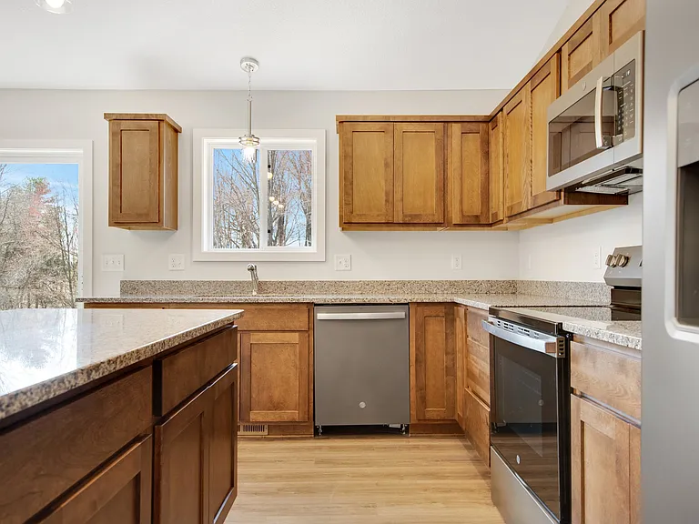 Very Nice Kitchen With GE "Slate" Colored Kitchen Appliances.