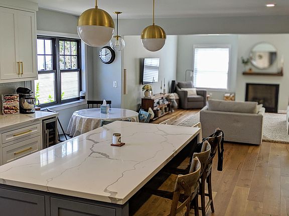 Kitchen, leading to living and dining spaces