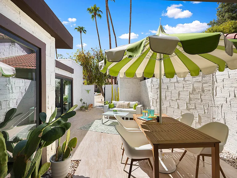 Front private patio with direct access to pool and spa.