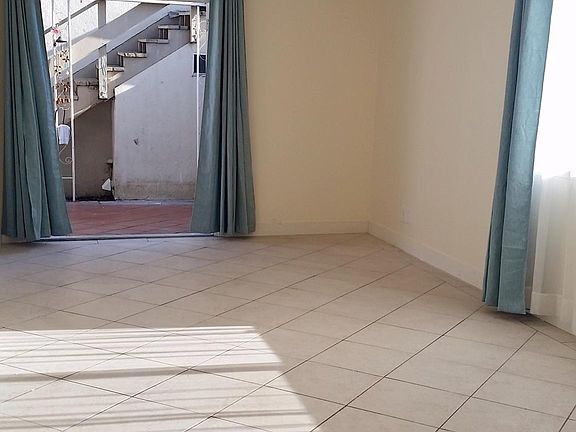 Living room open to patio