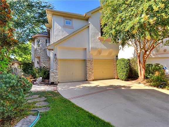 Fabulous lock-and-go style home at the end of the cul-de-sac backing to the greenbelt!