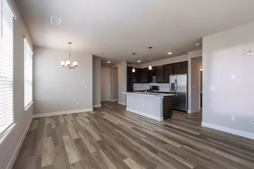Beautiful open living and dining area with a large kitchen and tons of windows!