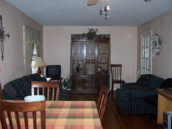 living and dining area with hardwood floors