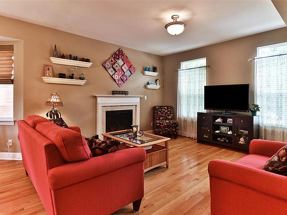 Another view of the living room with large transom windows