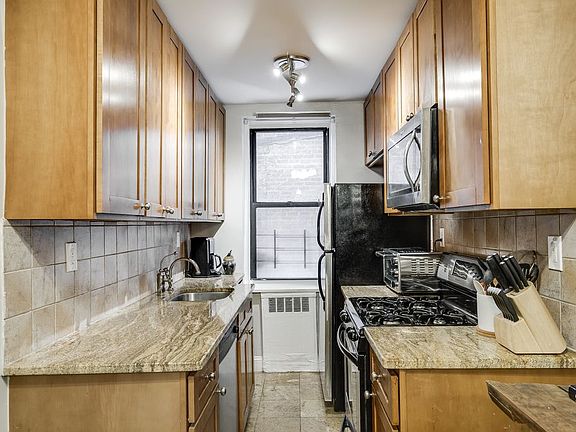 5th image of 66-15 Wetherole St APT A12