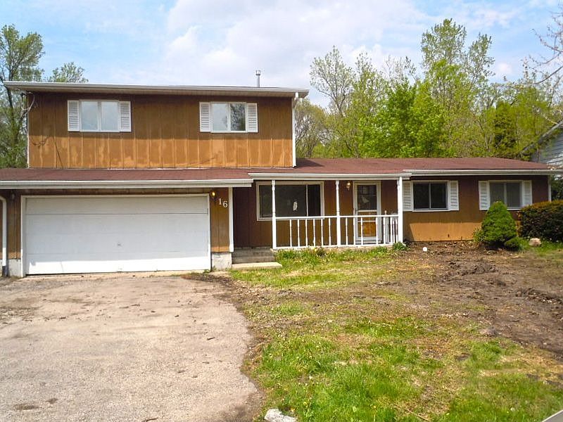 Front View of Large Cedar Home with Open Layout