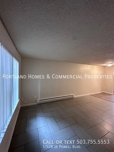 Charming 2-Bed Oasis with Modern Comforts on Powell Blvd. — Photo 3