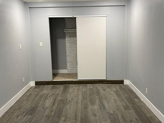 Bedroom and full-size walk-in closet.