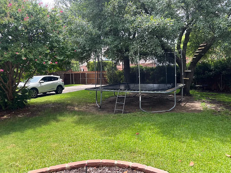 Another view of back driveway w security gate