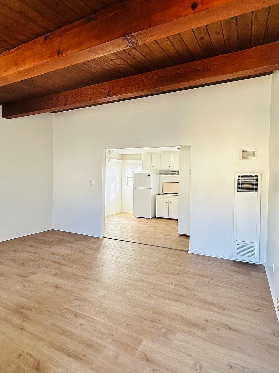 spacious living room with new floor and unique beautiful cathedral ceiling - 505 E Santa Anita Ave #F