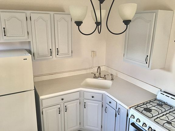 Kitchen, microwave shelf to be added above sink.