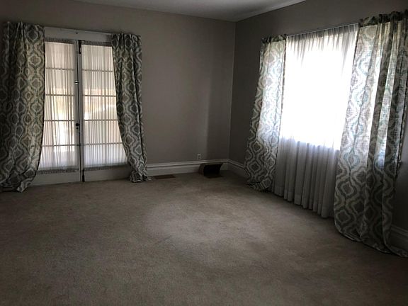 Living room with French doors leading porch